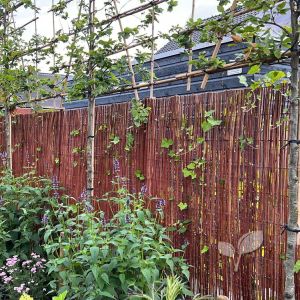 Hekbekleding met wilgenmat